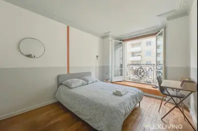 Un ou plusieurs lits dans un hébergement de l'établissement Flexliving - room - Paris 15