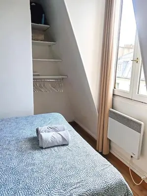 Un ou plusieurs lits dans un hébergement de l'établissement Le Perchoir - 2 pièces - Central Paris République - Lumineux