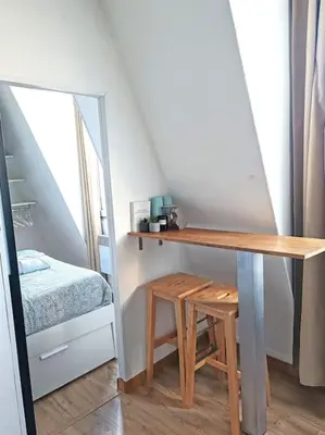 Un ou plusieurs lits dans un hébergement de l'établissement Le Perchoir - 2 pièces - Central Paris République - Lumineux