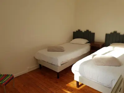 Un ou plusieurs lits dans un hébergement de l'établissement Maison à Issy les Moulineaux, proche de Paris