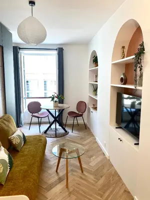Télévision ou salle de divertissement dans l'établissement Brand New Apartment - Rue Cler Paris