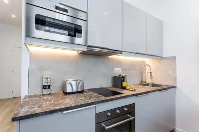 Cuisine ou kitchenette dans l'établissement Intimate apartment - 1BR-4P - Republique