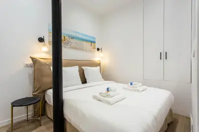 Un ou plusieurs lits dans un hébergement de l'établissement Intimate apartment - 1BR-4P - Republique