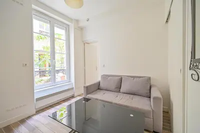 Coin salon dans l'établissement Appartement Suite Truffaut