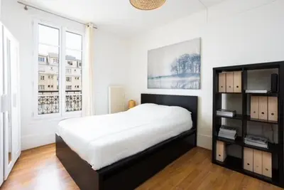 Un ou plusieurs lits dans un hébergement de l'établissement Appartement Grenelle