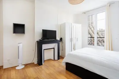 Télévision ou salle de divertissement dans l'établissement Appartement Grenelle