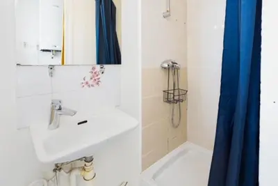 Salle de bains dans l'établissement Appartement Grenelle