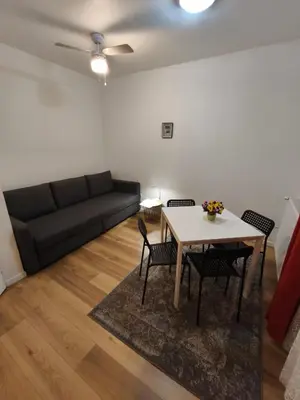 Coin salon dans l'établissement Un deux pièces et un jardin à Villejuif