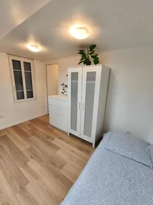 Un ou plusieurs lits dans un hébergement de l'établissement Un deux pièces et un jardin à Villejuif