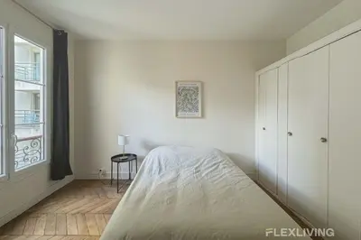 Un ou plusieurs lits dans un hébergement de l'établissement Flexliving - Room - Mesnil