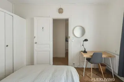 Un ou plusieurs lits dans un hébergement de l'établissement Flexliving - Room - Mesnil