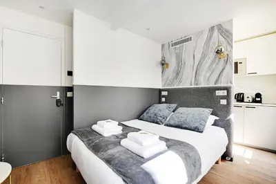 Un ou plusieurs lits dans un hébergement de l'établissement Cosy Studio for 2P with A-C - Near Montmartre