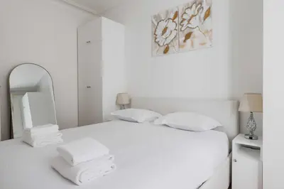 Un ou plusieurs lits dans un hébergement de l'établissement Cosy and chic apartment -1BD-4P- Auteuil