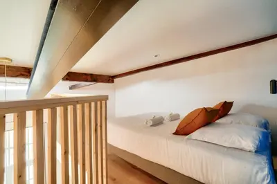 Un ou plusieurs lits dans un hébergement de l'établissement Temps suspendu - Sublime duplex avec mezzanine pour 4