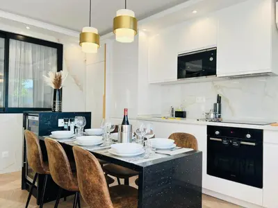Cuisine ou kitchenette dans l'établissement Appartement luxueux Le Bon Marché Paris 6