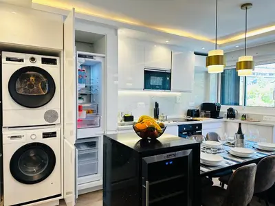 Cuisine ou kitchenette dans l'établissement Appartement luxueux Le Bon Marché Paris 6