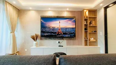 Télévision ou salle de divertissement dans l'établissement Appartement luxueux Le Bon Marché Paris 6