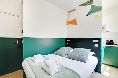 Un ou plusieurs lits dans un hébergement de l'établissement Cosy Cocoon for 2P with A-C - Near Montmartre