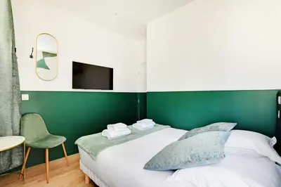 Un ou plusieurs lits dans un hébergement de l'établissement Cosy Cocoon for 2P with A-C - Near Montmartre