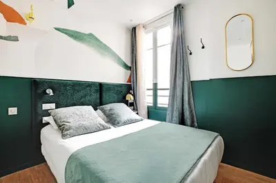 Un ou plusieurs lits dans un hébergement de l'établissement Beautiful Studio for 2P with A-C - Near Montmartre