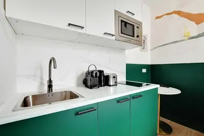 Cuisine ou kitchenette dans l'établissement Beautiful Studio for 2P with A-C - Near Montmartre