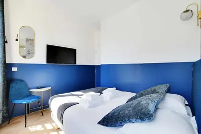Un ou plusieurs lits dans un hébergement de l'établissement Studio Cosy for 2P with A-C - Near Montmartre