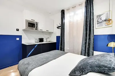 Un ou plusieurs lits dans un hébergement de l'établissement Charming Studio - 2P with AC Near Montmartre