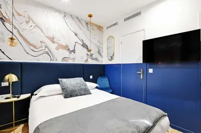 Un ou plusieurs lits dans un hébergement de l'établissement Charming Studio - 2P with AC Near Montmartre