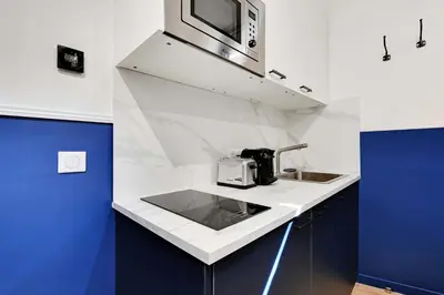 Cuisine ou kitchenette dans l'établissement Charming Studio - 2P with AC Near Montmartre