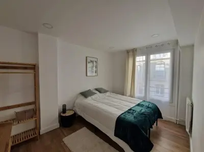 Un ou plusieurs lits dans un hébergement de l'établissement Élégance moderne 15e - Confort près Tour Eiffel