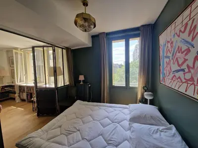 Un ou plusieurs lits dans un hébergement de l'établissement Luxe parisien, charme 16e - À 2 pas du Trocadéro