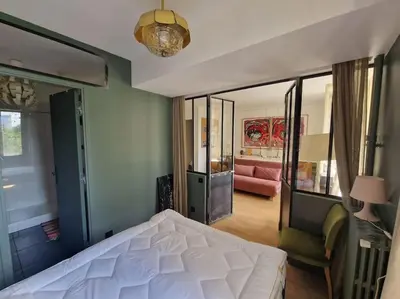 Un ou plusieurs lits dans un hébergement de l'établissement Luxe parisien, charme 16e - À 2 pas du Trocadéro