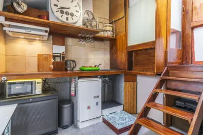 Cuisine ou kitchenette dans l'établissement Loft central