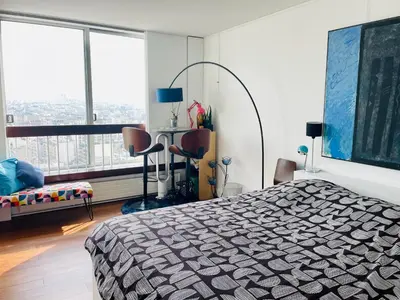 Un ou plusieurs lits dans un hébergement de l'établissement Panoramique vue NEW design proche Tour Eiffel