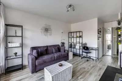 Coin salon dans l'établissement Studio Avec vue Panoramique Paris 11