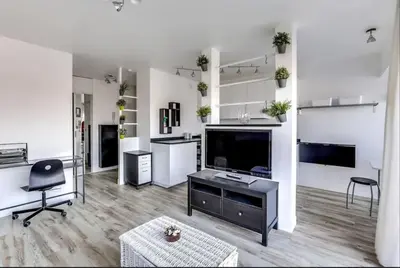 Cuisine ou kitchenette dans l'établissement Studio Avec vue Panoramique Paris 11