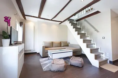Coin salon dans l'établissement Paris - Cosy Duplex près des Champs Elysées