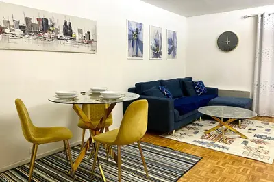 Coin salon dans l'établissement Chambre privée chez l'habitant - Parking Métro - Paris Porte de Versailles