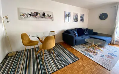 Coin salon dans l'établissement Chambre privée chez l'habitant - Parking Métro - Paris Porte de Versailles