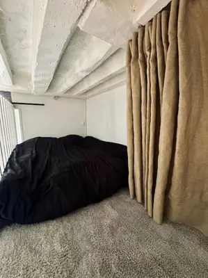 Un ou plusieurs lits dans un hébergement de l'établissement Appartement au cœur de Paris