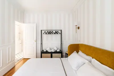 Un ou plusieurs lits dans un hébergement de l'établissement Charming Parisian Flat near Eiffel Tower