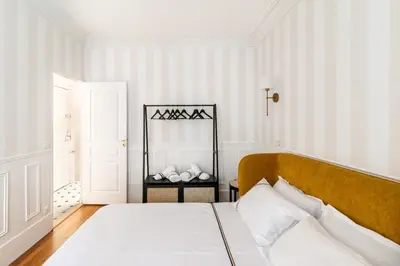 Un ou plusieurs lits dans un hébergement de l'établissement Charming Parisian Flat near Eiffel Tower
