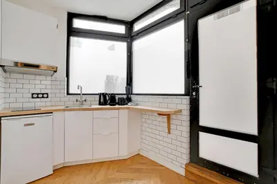 Cuisine ou kitchenette dans l'établissement Charming apartment - 1BR-4P - Les Halles