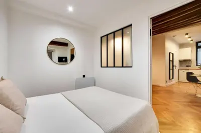 Un ou plusieurs lits dans un hébergement de l'établissement Charming apartment - 1BR-4P - Les Halles