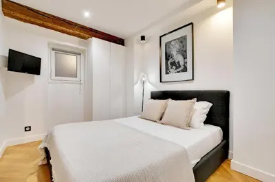 Un ou plusieurs lits dans un hébergement de l'établissement Charming apartment - 1BR-4P - Les Halles