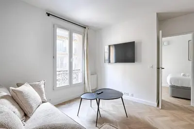 Télévision ou salle de divertissement dans l'établissement Saussier Ternes Charming Apartment 4P