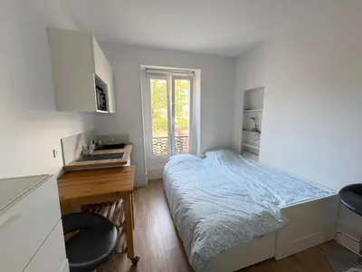 Un ou plusieurs lits dans un hébergement de l'établissement Cozy Studio 10min from La Défense Arena