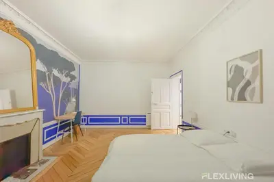 Un ou plusieurs lits dans un hébergement de l'établissement Flexliving - room - Neuilly-sur-Seine