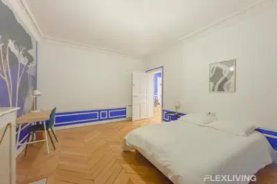 Un ou plusieurs lits dans un hébergement de l'établissement Flexliving - room - Neuilly-sur-Seine