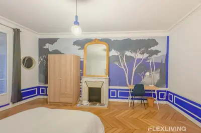 Un ou plusieurs lits dans un hébergement de l'établissement Flexliving - room - Neuilly-sur-Seine